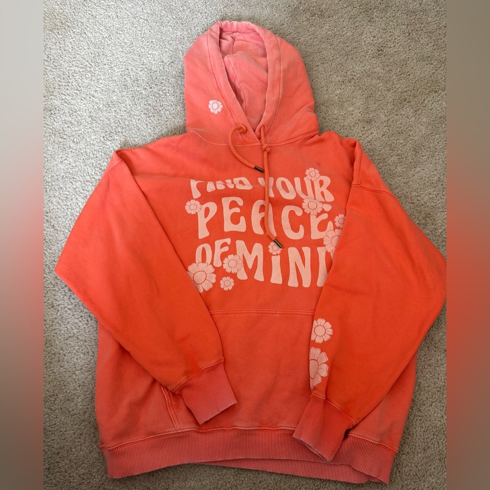 American Eagle sweat shirts size medium orange 
“Find your peace of mind”